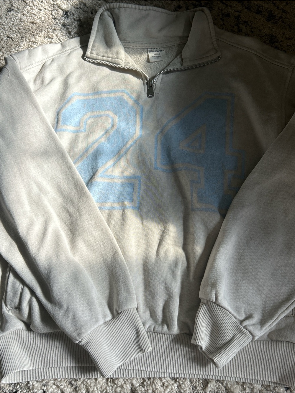 No Boundaries Cream Half-Zip Sweater with Light Blue '24' Graphic